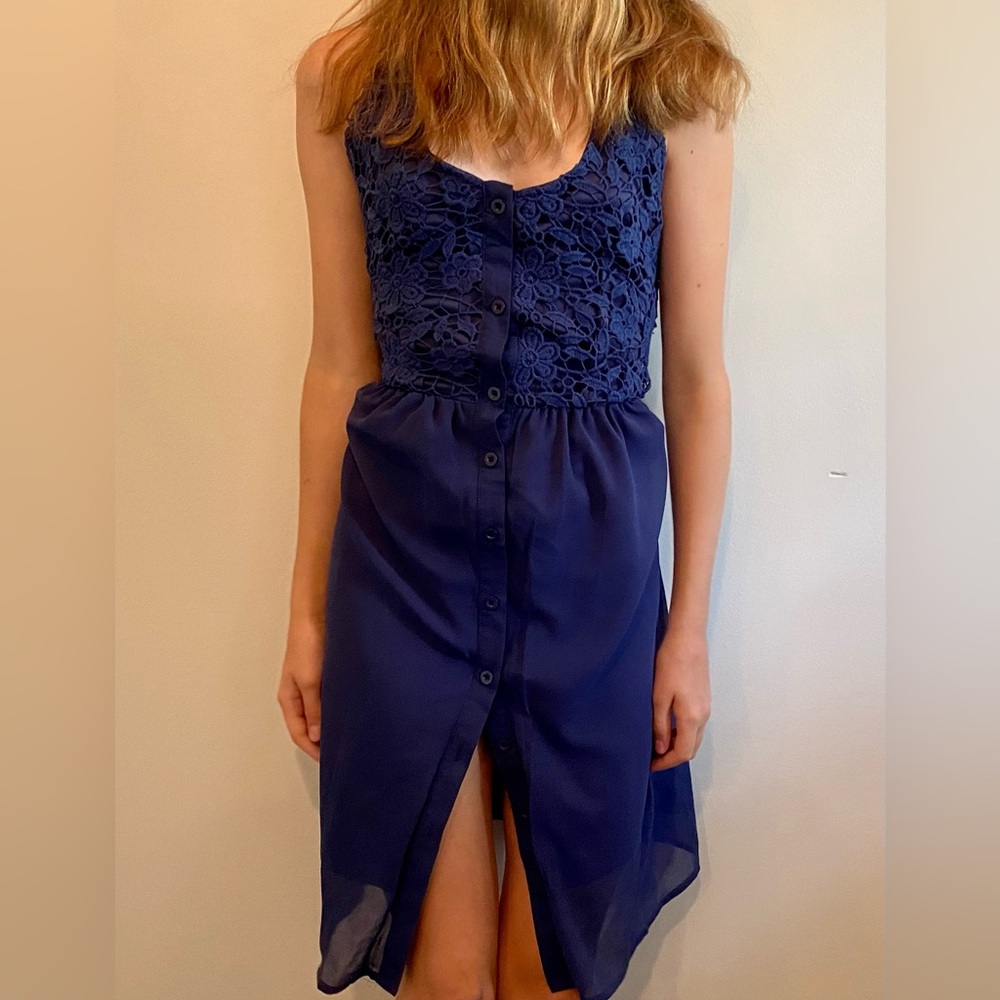 Navy semi floral dress in a size small, with buttons